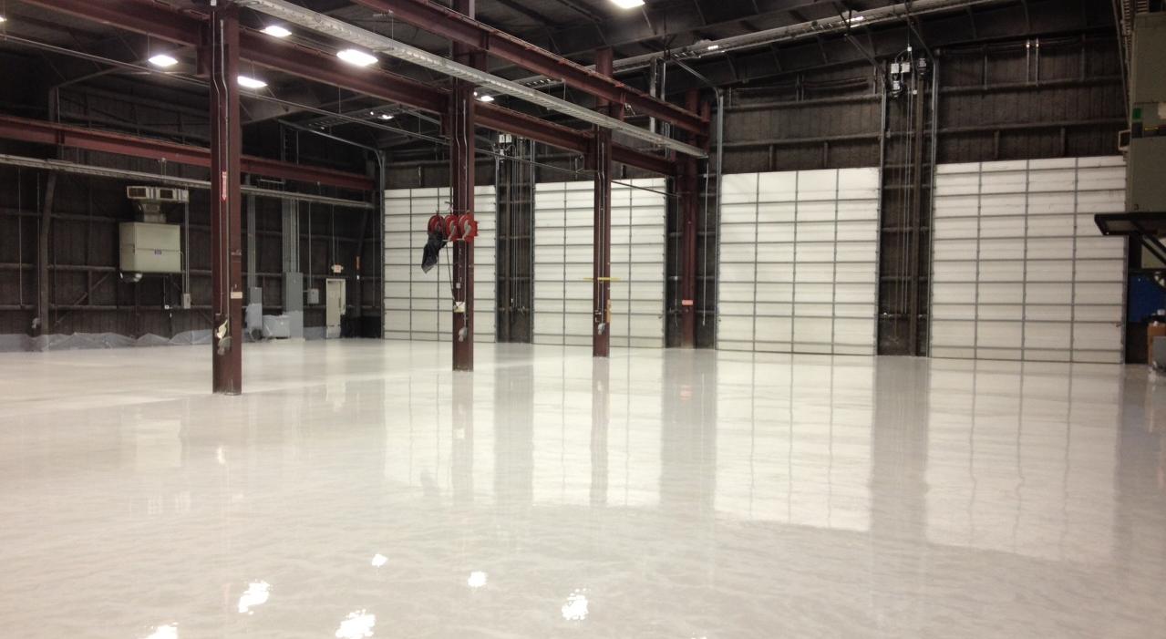 Solid color epoxy floor in a space