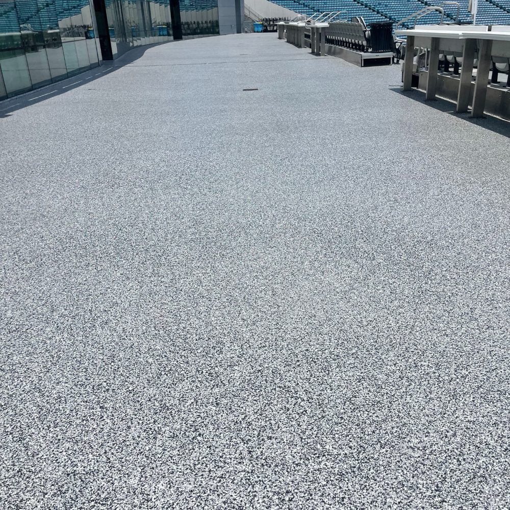 Finished epoxy floor after Apex industrial install — Heavy Equipment Bay