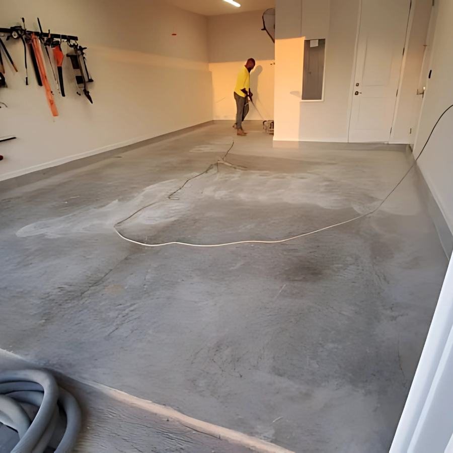 Apex crew installing a blue flake epoxy garage floor in Charleston, SC
