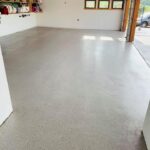 Finished gray flake epoxy garage floor by Apex
