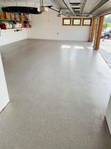 Finished gray flake epoxy garage floor by Apex