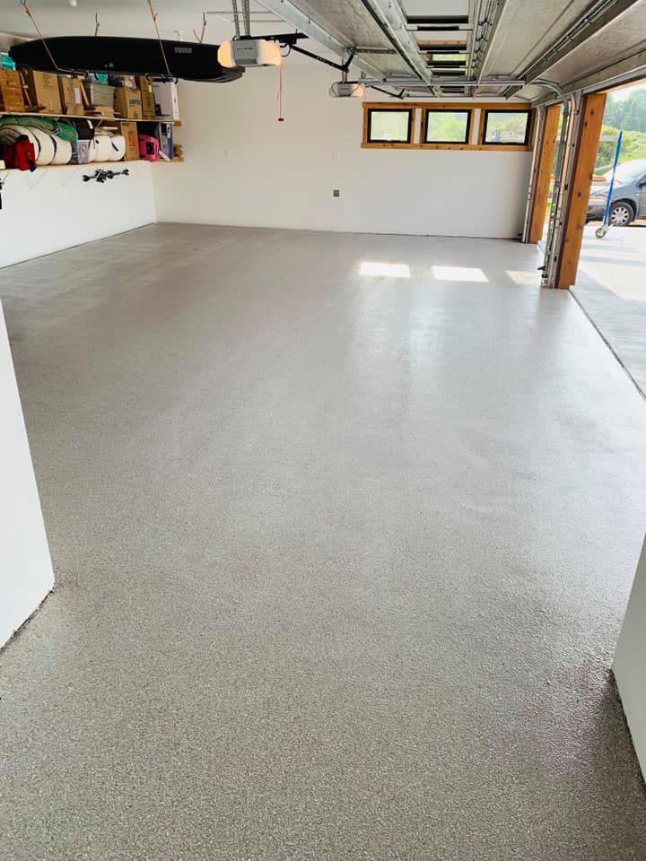 Finished gray flake epoxy garage floor by Apex