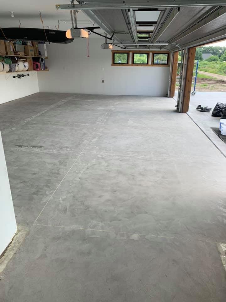 Bare concrete garage floor before Apex epoxy coating