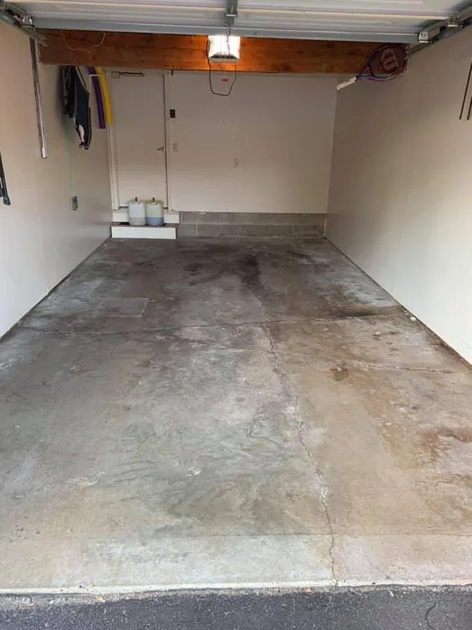 Cracked bare concrete slab before Apex epoxy install in Boca Raton, FL