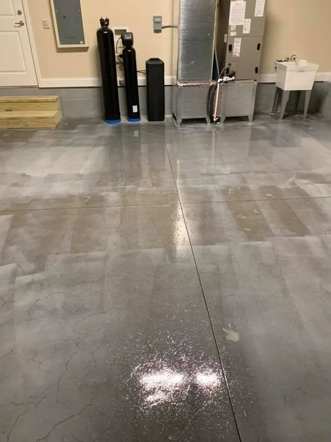 Wet-cleaned bare concrete slab before Apex epoxy install in Atlanta, GA