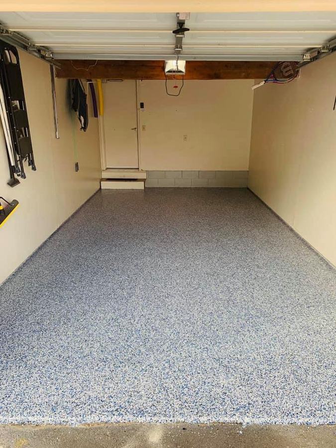 Finished blue flake epoxy garage floor after Apex install in Boca Raton, FL