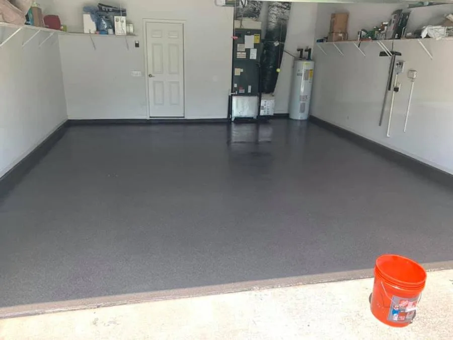 Finished dark gray solid epoxy garage floor after Apex install in Atlanta, GA