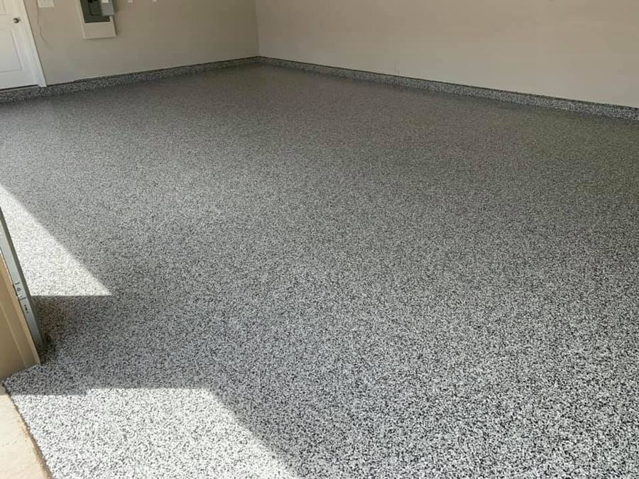 Finished gray flake epoxy garage floor after Apex install in Atlanta, GA
