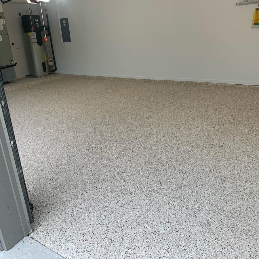Finished tan flake epoxy garage floor after Apex install in Fort Myers, FL