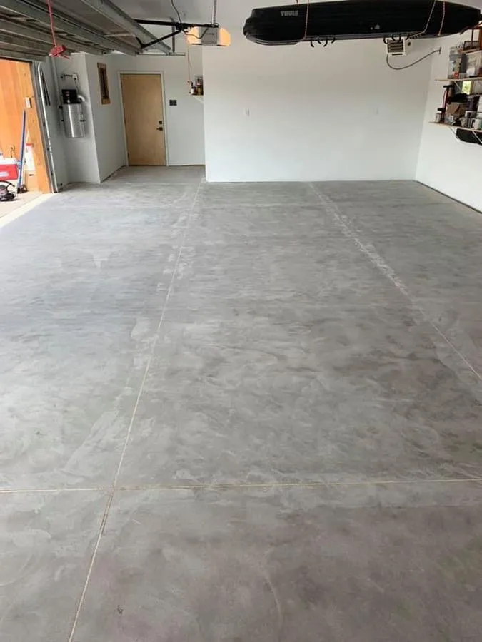Bare concrete garage slab before Apex epoxy install in Jacksonville, FL