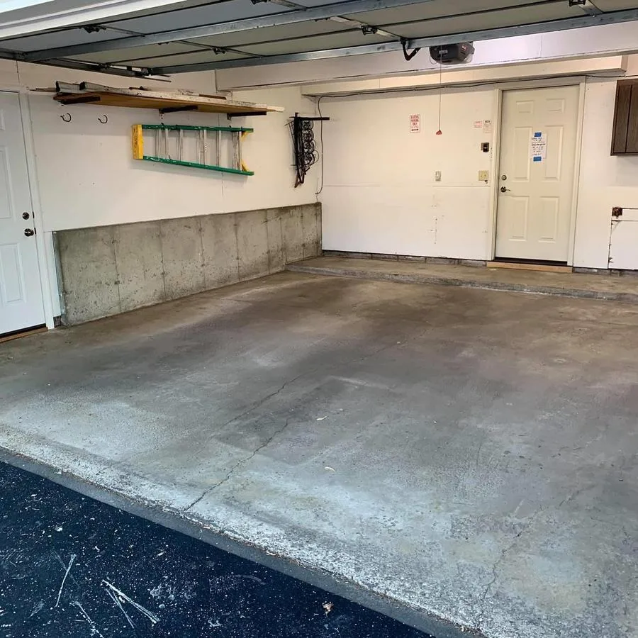 Cracked bare concrete slab before Apex epoxy install in Charleston, SC